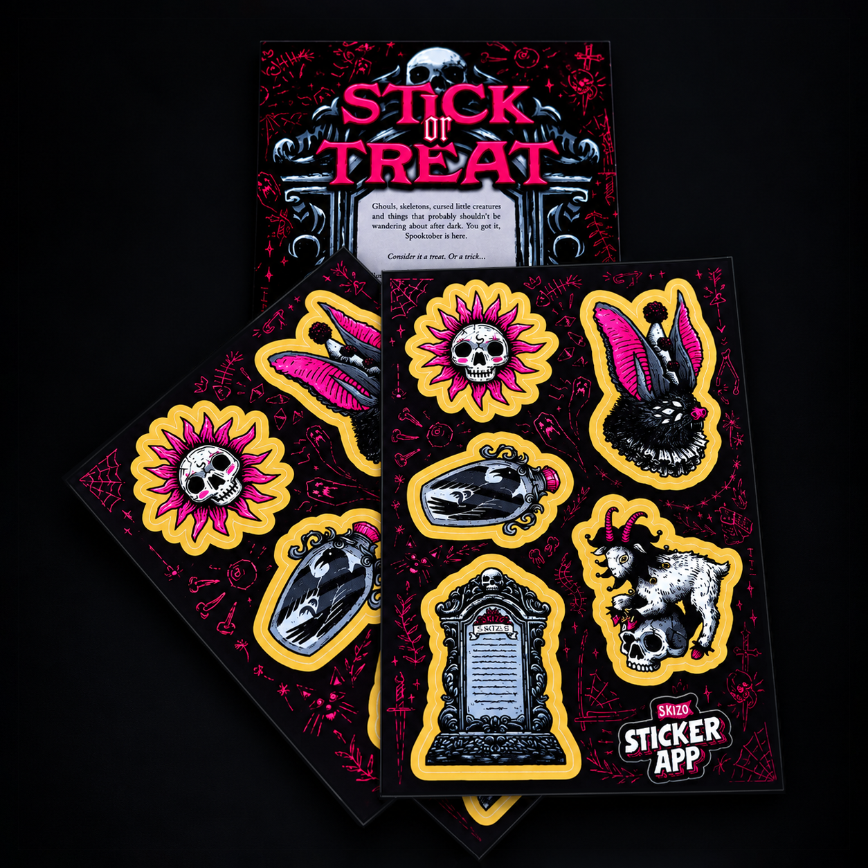 Sticker sheets lying on a dark background, with carnival themed cartoons of bottles, tombs and a goat.