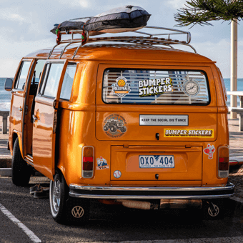 A van full of car and bumper stickers.