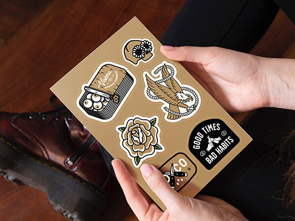 A person holding a custom Sticker Sheet.