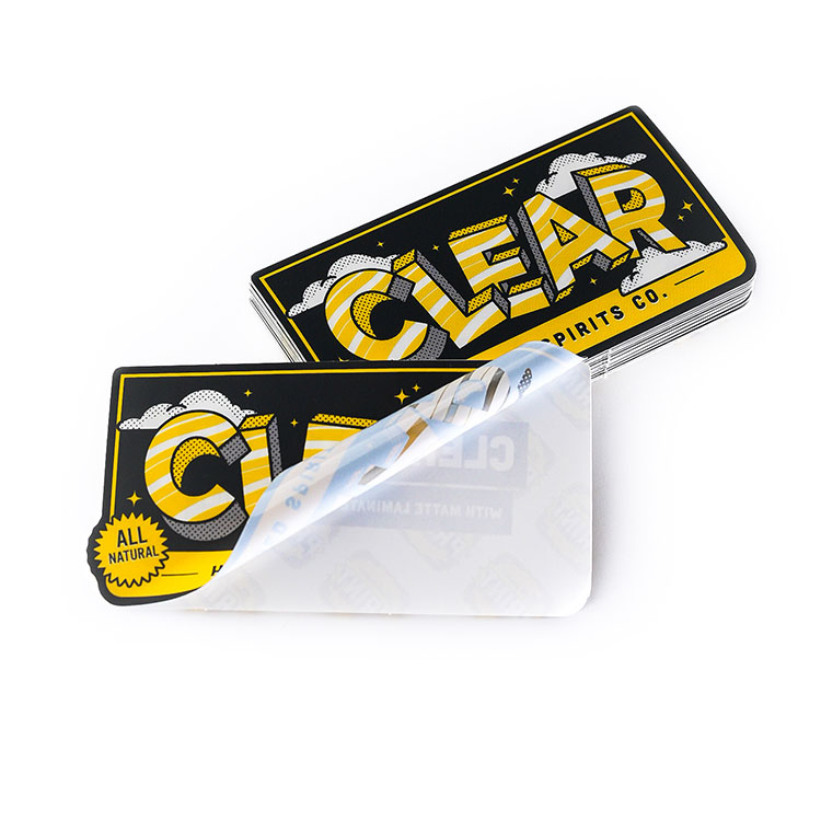 A pair of clear stickers sitting on top of each other